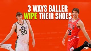 why do basketball players touch their shoes