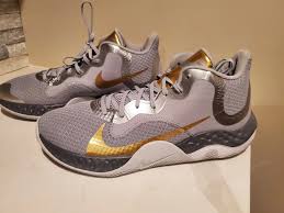 gold nike shoes