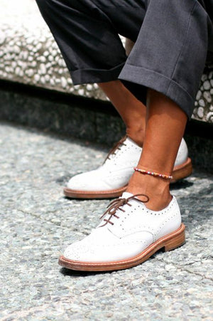 Stepping into Style: The Timeless Elegance of Men's White Dress Shoes